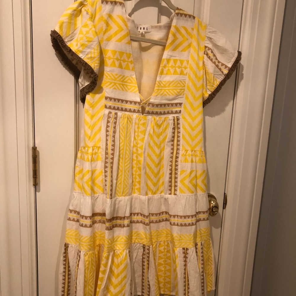 Boutique fully lined dress made in India.